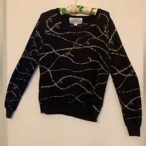 Chic Black Sweater with Patterned Design